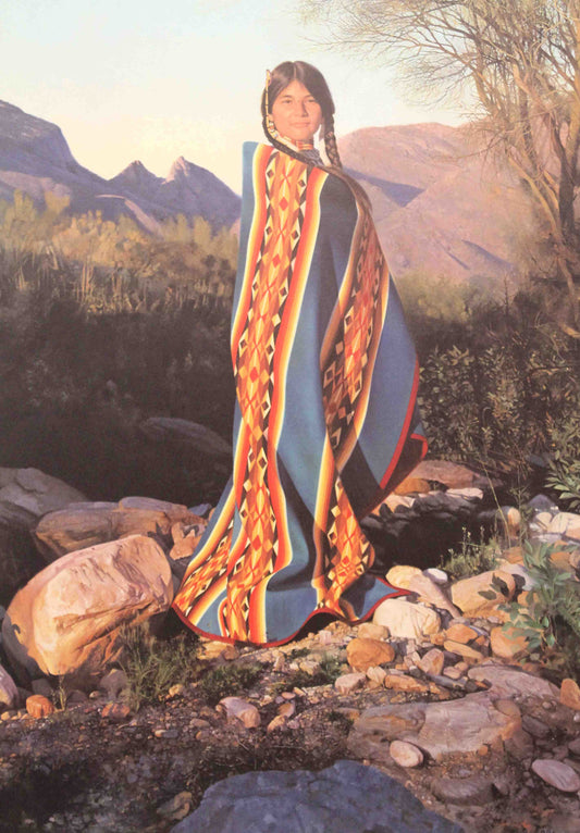Donald Crowley print of a Native American girl wrapped in a blanket, standing in a desert landscape at sunset.